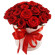 красные розы в шляпной коробке. Италия